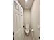 Small half bathroom with toilet and single sink at 291 Whistling Duck Trl, St Cloud, FL 34771