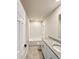 Clean bathroom, granite countertop, shower, and bathtub at 291 Whistling Duck Trl, St Cloud, FL 34771