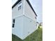 House exterior showcasing gray siding and a corner view at 291 Whistling Duck Trl, St Cloud, FL 34771