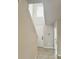 Inviting foyer with soaring ceilings, tile flooring and a modern thermostat at 291 Whistling Duck Trl, St Cloud, FL 34771