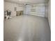 Spacious garage with sealed floor and automatic door at 291 Whistling Duck Trl, St Cloud, FL 34771