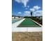 Bocce ball court surrounded by trimmed landscaping at 7358 Sw 76Th Ter, Ocala, FL 34481
