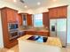 Well-equipped kitchen featuring stainless steel appliances and granite counters at 7465 Excitement Dr, Reunion, FL 34747