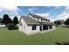 Rendering of a two-story home with a covered porch at 405 Long And Winding Rd, Howey In The Hills, FL 34737