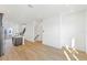 Bright, open-concept living space with light wood floors and minimalist design at 2110 Whitney Marsh Aly, Orlando, FL 32804