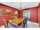 Cozy dining room with view of other living spaces and an ornate chandelier at 51 Oakleigh Ln, Maitland, FL 32751