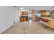 Spacious kitchen features wood cabinets, stainless steel appliances, and a breakfast bar at 51 Oakleigh Ln, Maitland, FL 32751