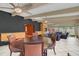Beautiful sunroom with beamed ceilings, neutral decor, and bright natural light at 51 Oakleigh Ln, Maitland, FL 32751