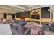 Entertainment area includes a lounge space and access to an adjacent dining area at 51 Oakleigh Ln, Maitland, FL 32751