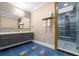 Contemporary bathroom features a sleek vanity, shower, neutral tones, and a spacious layout, providing a spa-like experience at 1021 Fantasy Dr, Davenport, FL 33896