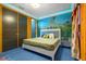 A whimsical bedroom features unique decor, custom drapes, and themed artwork, creating an imaginative space at 1021 Fantasy Dr, Davenport, FL 33896