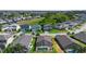 A residential neighborhood showcases various home styles, screened-in pools, and manicured landscaping at 503 Balmoral Dr, Davenport, FL 33896