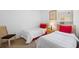 Comfortable twin bedroom with simple decor, a side table, a lamp, and a window at 503 Balmoral Dr, Davenport, FL 33896