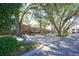 View of a tree-lined street in downtown with restaurants and shops at 501 N Dillard St, Winter Garden, FL 34787
