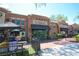 Exterior view of Plant Street Market, featuring brick architecture and outdoor seating at 501 N Dillard St, Winter Garden, FL 34787