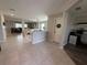 Open-concept living space features tile flooring and easy access to other living areas at 2346 Upland Ln, Apopka, FL 32712