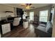 Well-lit home office with custom built-ins and comfortable seating, perfect for productivity at 2346 Upland Ln, Apopka, FL 32712