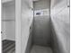 Clean bathroom with gray tile shower and a window for natural light at 16941 Sw 30Th Avenue Sw Rd, Ocala, FL 34473