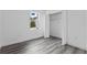 Bedroom with gray vinyl flooring and a walk in closet at 16941 Sw 30Th Avenue Sw Rd, Ocala, FL 34473