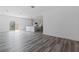 Open concept kitchen with white cabinets and a kitchen island at 16941 Sw 30Th Avenue Sw Rd, Ocala, FL 34473