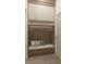 Functional mudroom featuring built-in storage, bench seating, and stylish decor at 110 W Railway Ave, Oakland, FL 34760