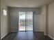 Bedroom with a view to the pool area and modern flooring at 1687 Kona Ln, Davenport, FL 33897