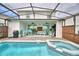 Gorgeous screened pool with a patio area and outdoor furniture perfect for entertaining at 1687 Kona Ln, Davenport, FL 33897