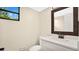 Simple half bathroom with vanity and updated fixtures at 7972 Snowberry Cir, Orlando, FL 32819