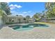 Inviting kidney-shaped pool with large patio area at 107 Hickory Tree Rd, Longwood, FL 32750