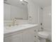 Bright bathroom with modern fixtures, including a large mirror and updated vanity at 4878 Conway Rd # 91, Orlando, FL 32812