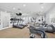 Fully equipped fitness center with treadmills, elliptical machines, and mirrored wall at 4878 Conway Rd # 91, Orlando, FL 32812