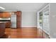 This kitchen features stainless steel appliances, hardwood floors and an open layout at 4878 Conway Rd # 91, Orlando, FL 32812