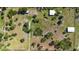 Overhead view of property showcasing buildings, yard, and driveway at 6799 Chad Jason Rd, Saint Cloud, FL 34773