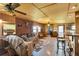 Rustic living room with a wood-burning stove and bar at 6799 Chad Jason Rd, Saint Cloud, FL 34773