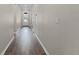 Hallway with hard surface floors leading to the front door of the home at 10204 Spring Lake Dr, Clermont, FL 34711