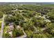 Property located in a lush, wooded neighborhood at 14315 Conifer Dr, Orlando, FL 32832