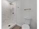 Clean bathroom with marble shower and a toilet at 14315 Conifer Dr, Orlando, FL 32832