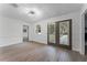 Bright dining room with french doors leading to the backyard at 14315 Conifer Dr, Orlando, FL 32832