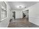 Bright dining room with hardwood floors and views to the kitchen at 14315 Conifer Dr, Orlando, FL 32832