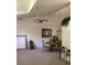 Open-concept dining room featuring neutral walls and carpet at 2717 Bayview Dr, Eustis, FL 32726