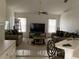 Inviting living room with comfortable sofas, ceiling fan and a large screen television at 2717 Bayview Dr, Eustis, FL 32726