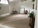 Spacious, bright living room with neutral carpet, ceiling fan and natural light throughout at 2717 Bayview Dr, Eustis, FL 32726