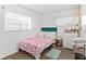 Bright bedroom with a double bed and neutral decor at 1788 N Hiawassee Rd, Orlando, FL 32818