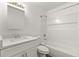 Bathroom featuring a shower and bathtub combination, white cabinetry, sink, and toilet at 3651 N Goldenrod Rd # 204, Winter Park, FL 32792