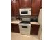 Kitchen with microwave, stove, and oven at 34001 Fortunado St, Sorrento, FL 32776