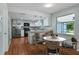 Kitchen and dining nook with stainless appliances, kitchen island, and seating area at 685 Chelsea Rd, Longwood, FL 32750