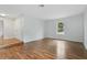 Large living room featuring hardwood floors, a neutral color palette, and natural light at 685 Chelsea Rd, Longwood, FL 32750