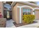 Front entrance with double door and decorative glass at 1106 Kerwood Cir, Oviedo, FL 32765