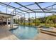 Inviting screened pool and spa with patio area at 1106 Kerwood Cir, Oviedo, FL 32765