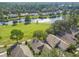 Lakeside living featuring scenic views of golf course and tree-lined streets at 1730 Stafford Springs Blvd, Mount Dora, FL 32757